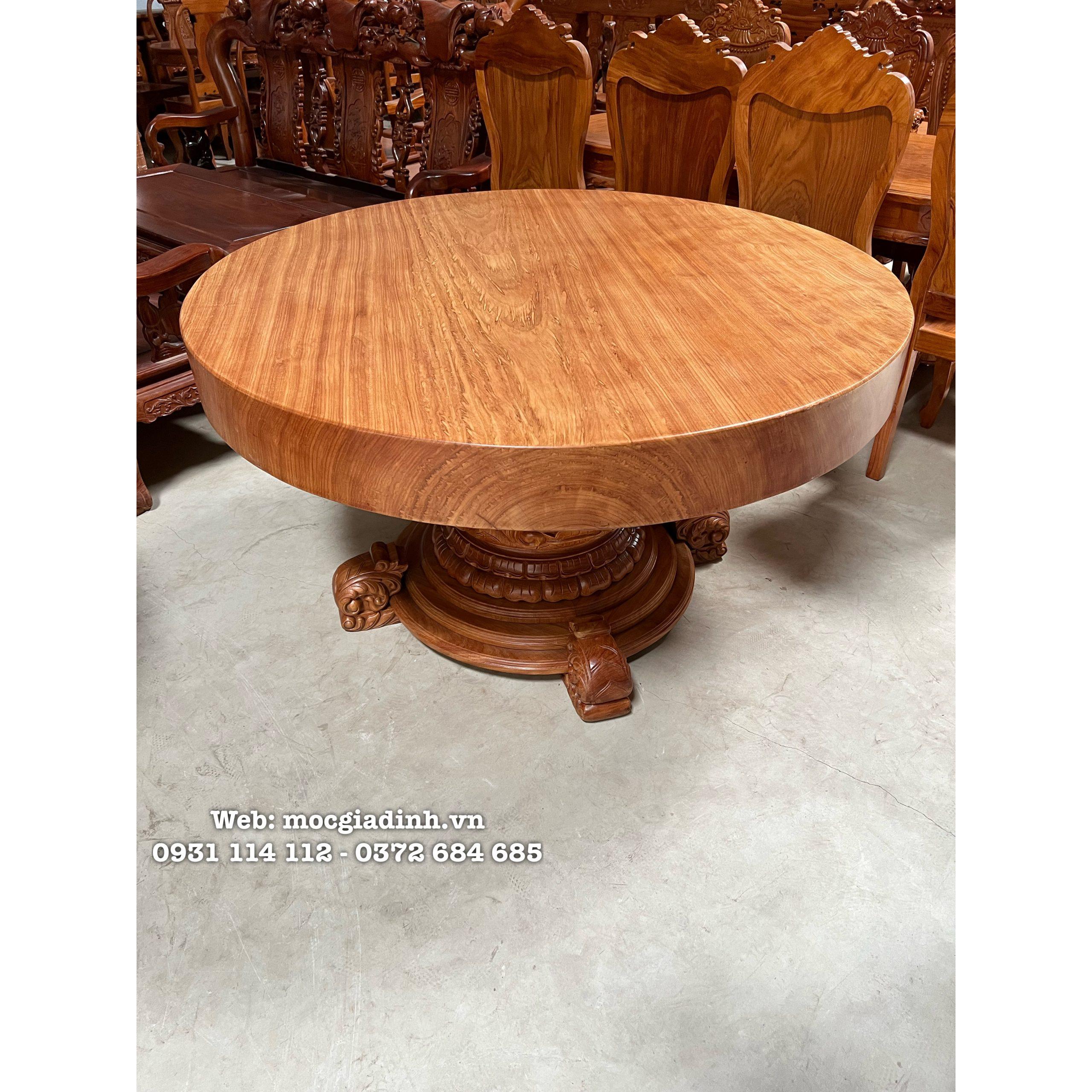 Bàn ăn gỗ gõ đỏ mặt nguyên khối