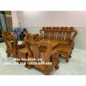 Bộ bàn ghế Gõ Đào Băng dài 4 tựa tay 12 Nghê nguyên khối