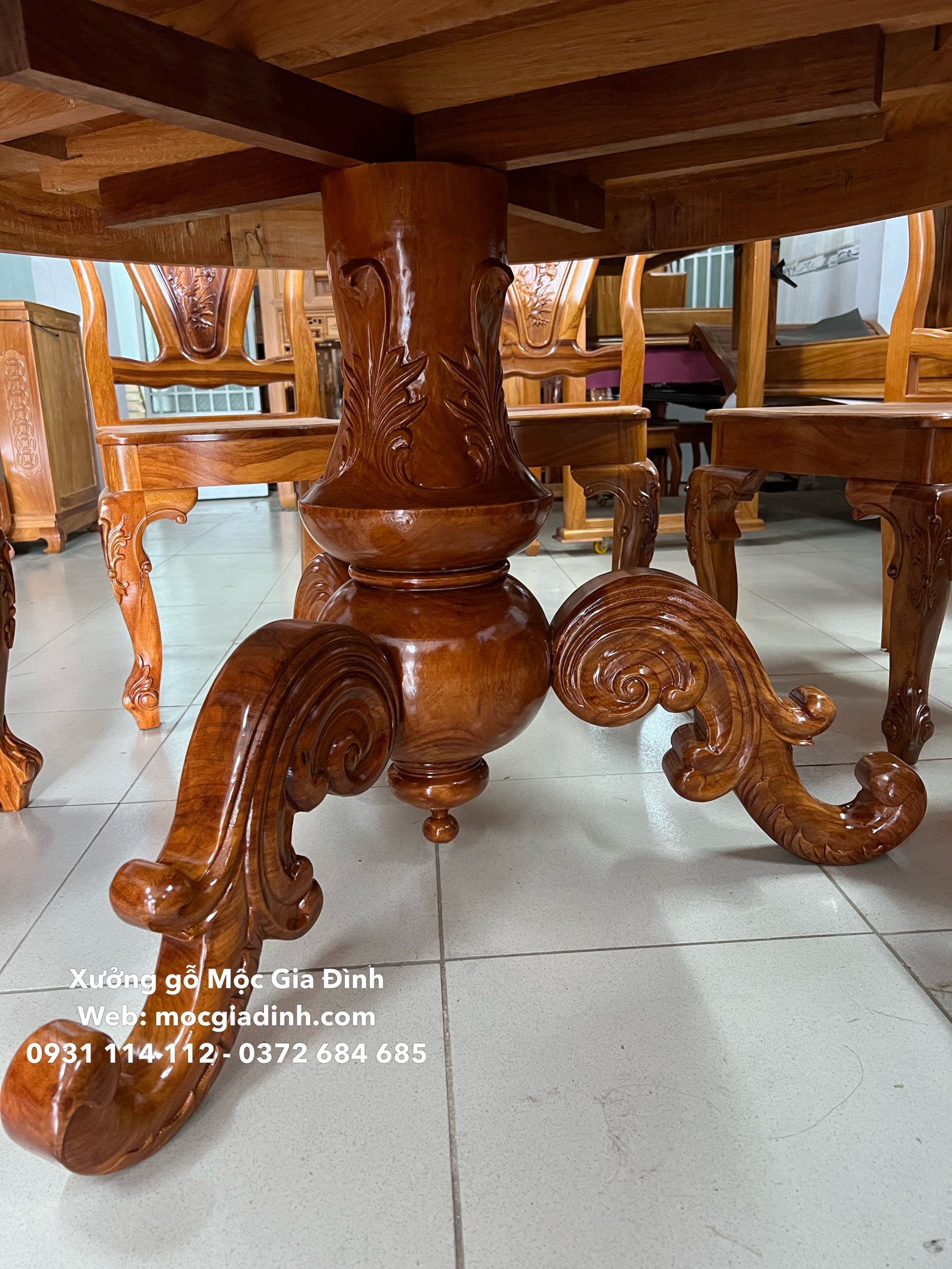 Bàn ăn gỗ gõ tròn 8 6 ghế trụ hồ lô