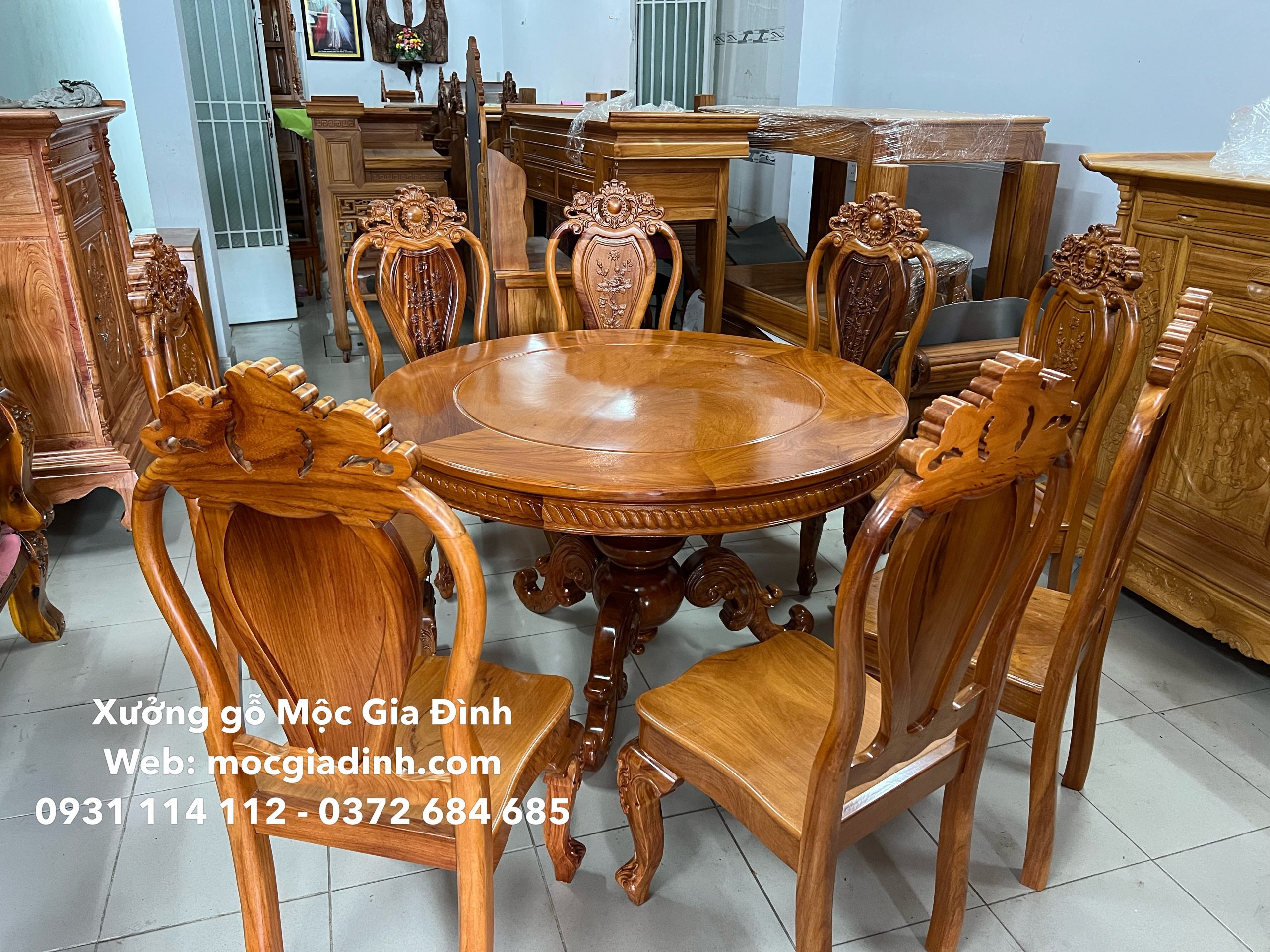 Bàn ăn gỗ gõ tròn 8 6 ghế